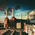 Industrial scene with tall chimneys and a colorful sky